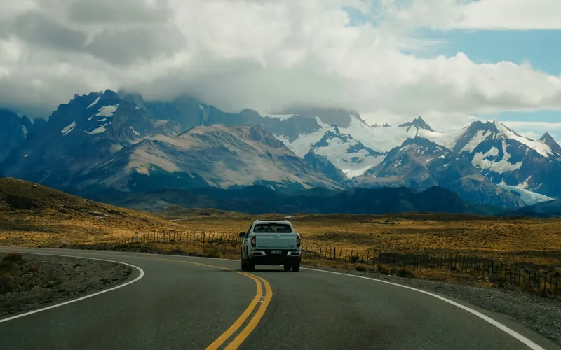 A 4x4 vehicle on a gravel track in the steppe above Lago Argentino